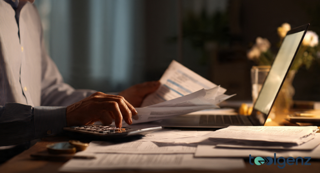 A laptop on a wooden desk displays a "Refund Status" screen with three color-coded notification boxes for Processing and Approved stages.