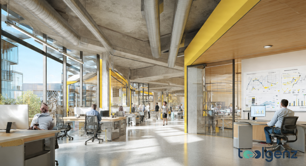 Modern open-concept office with glass walls, yellow accents, and professionals working at desks.